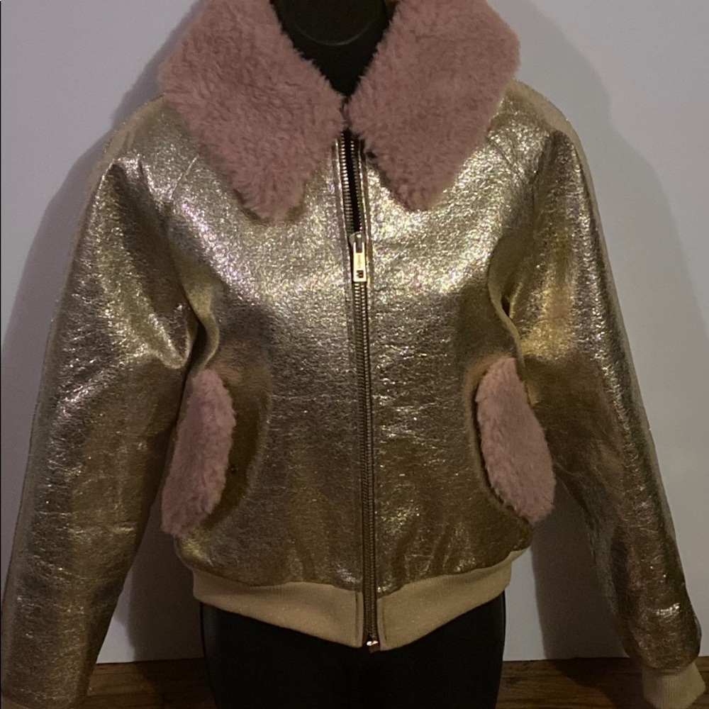 Gold leather bomber.